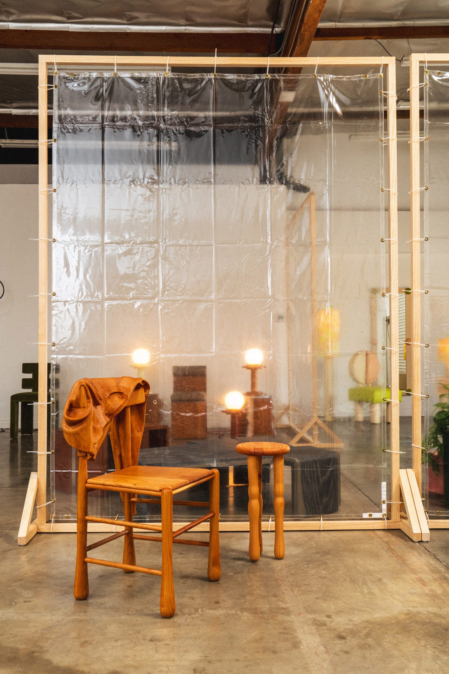 A wooden chair with carved wood sweater