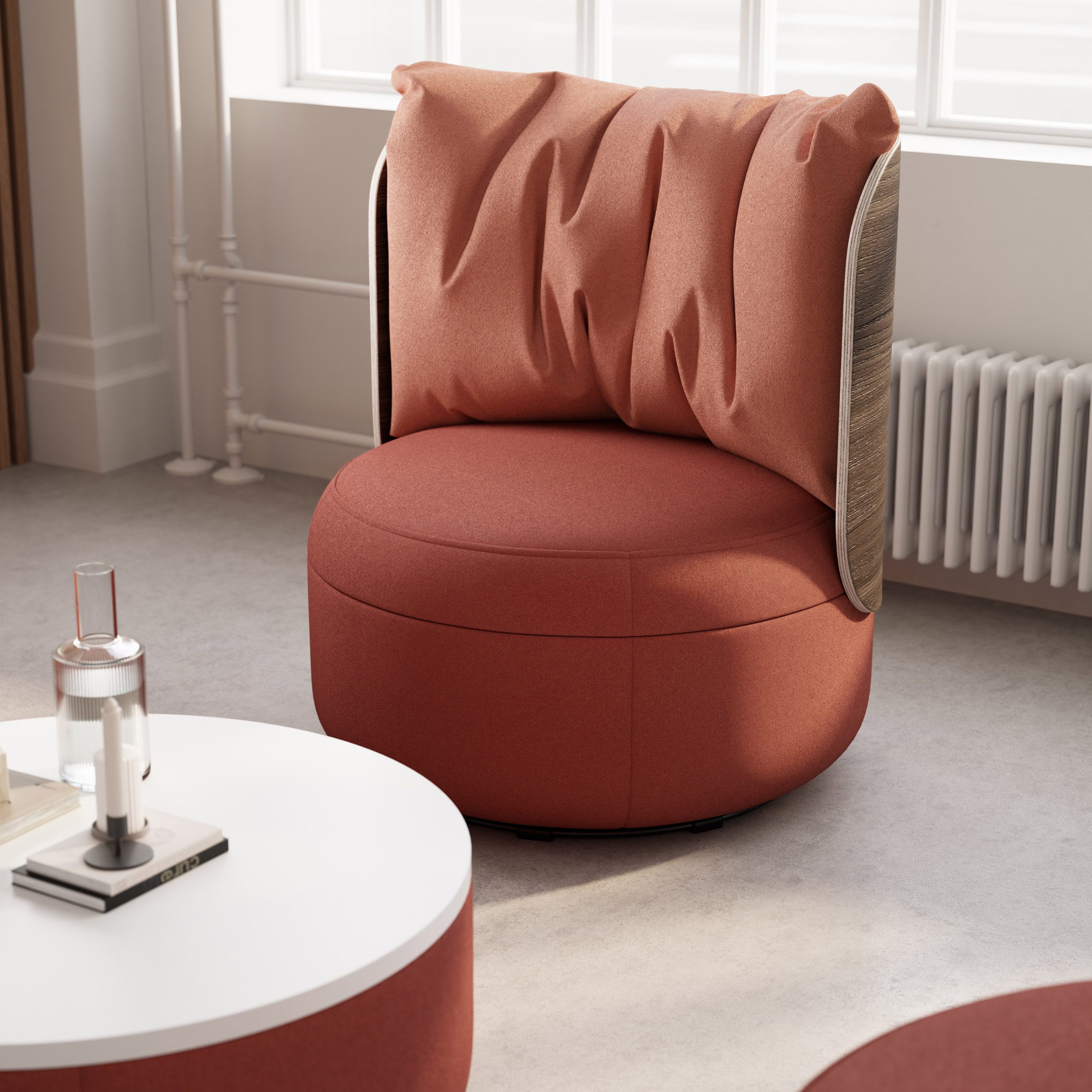 A curvilinear lounge chair from KFI Studio's Dotti collection with coral upholstery