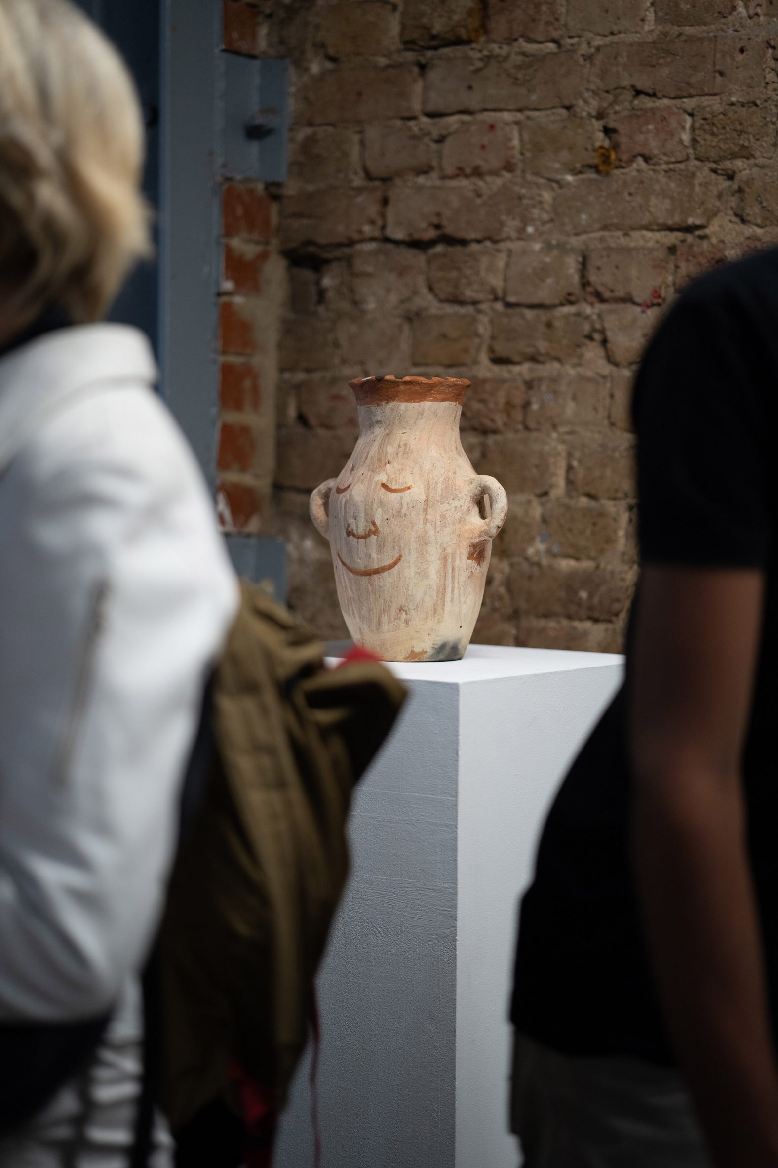 Vase with smiling face by Teshome Douglas-Campbell