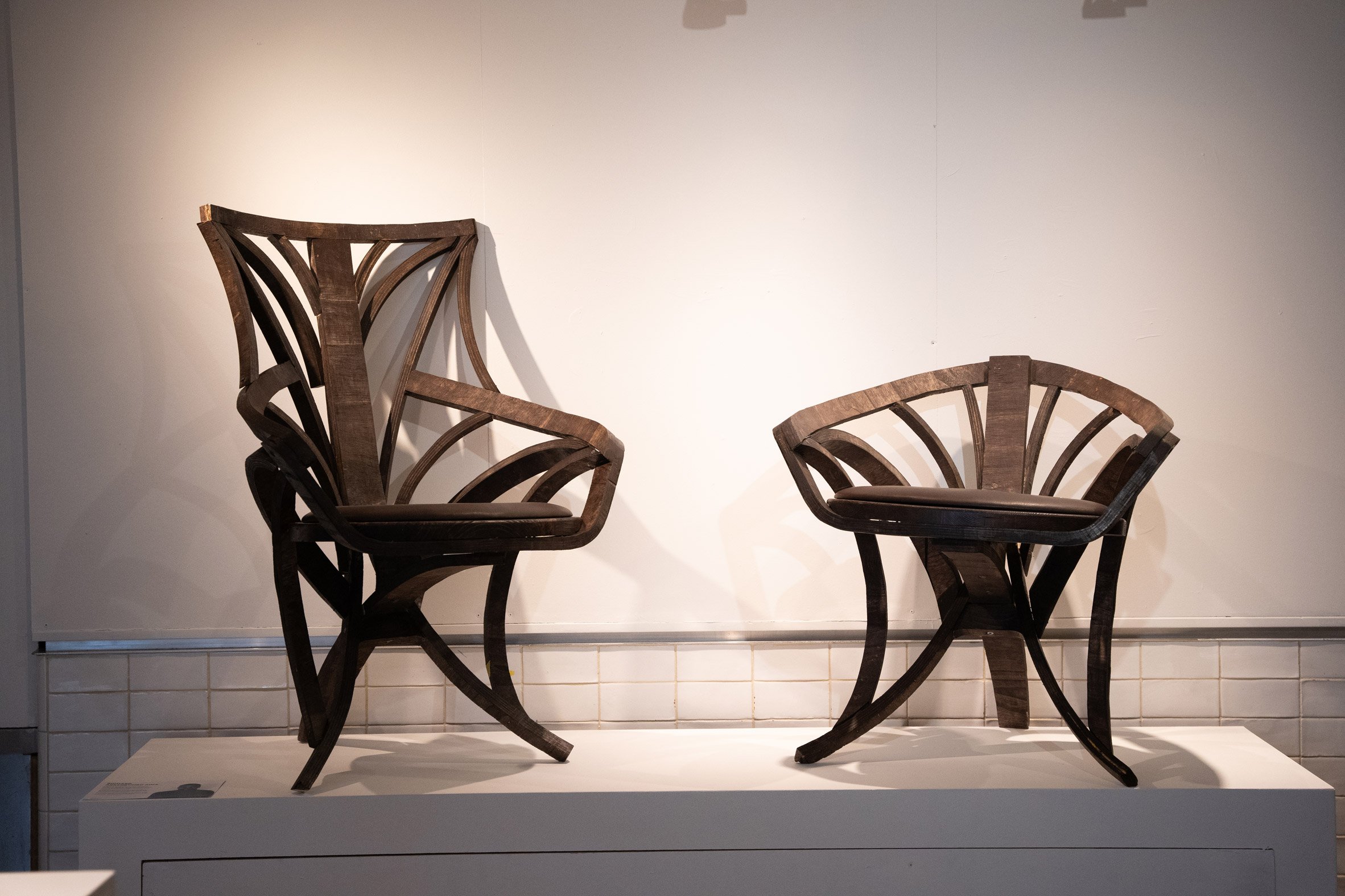 Two wooden chairs by Richard Adetokunbo Aina