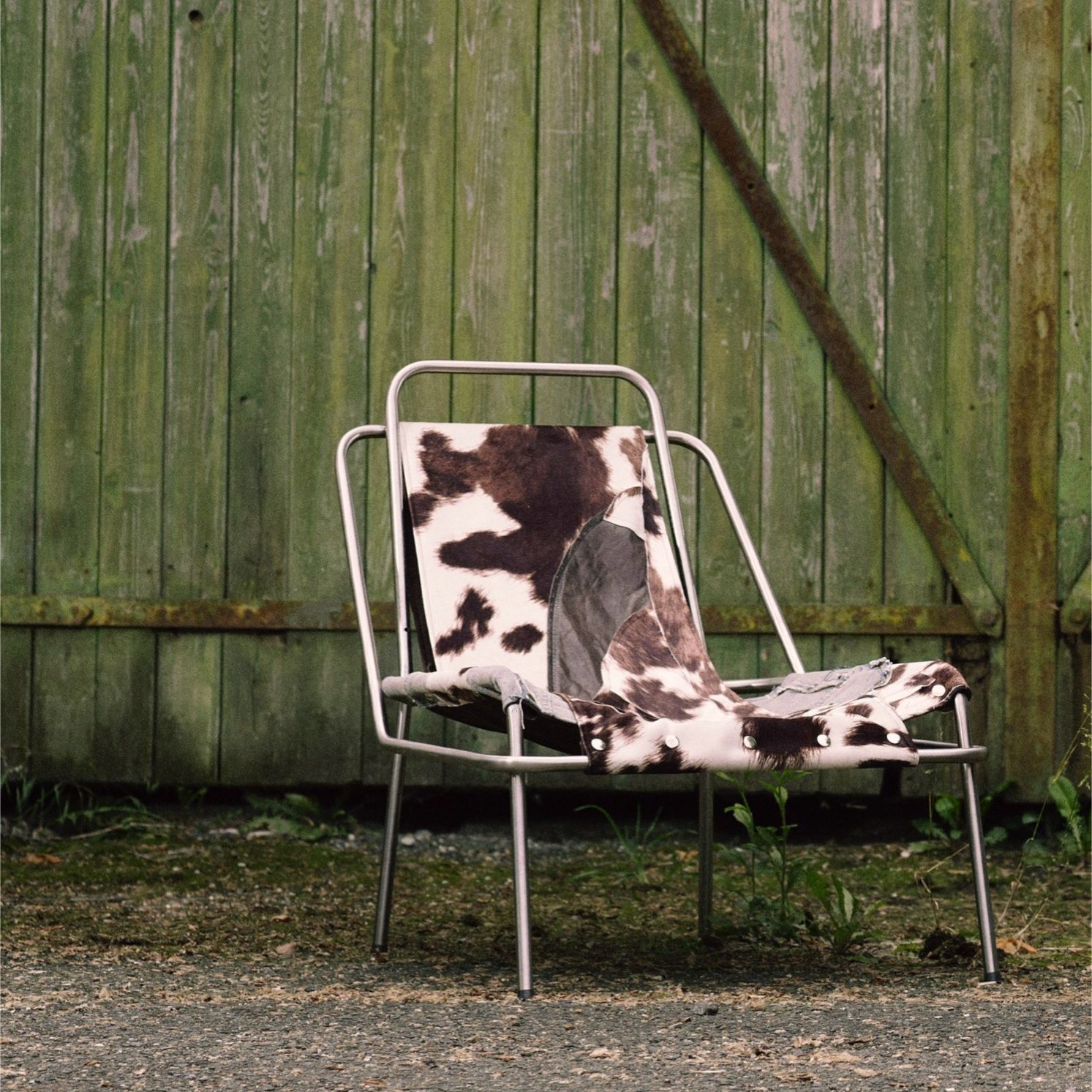 Cowprint chair made with steel pipes